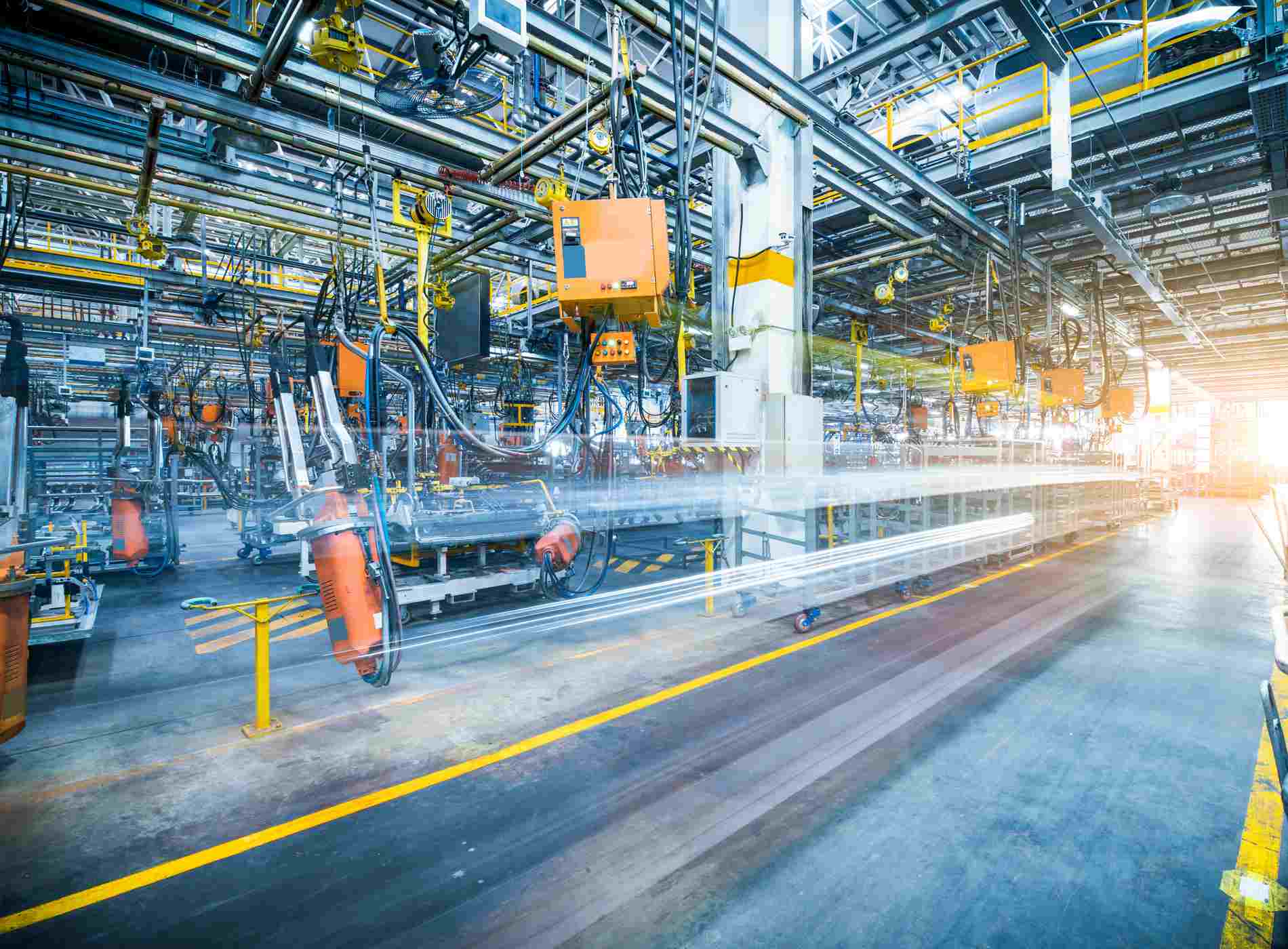 robots welding in a car factory