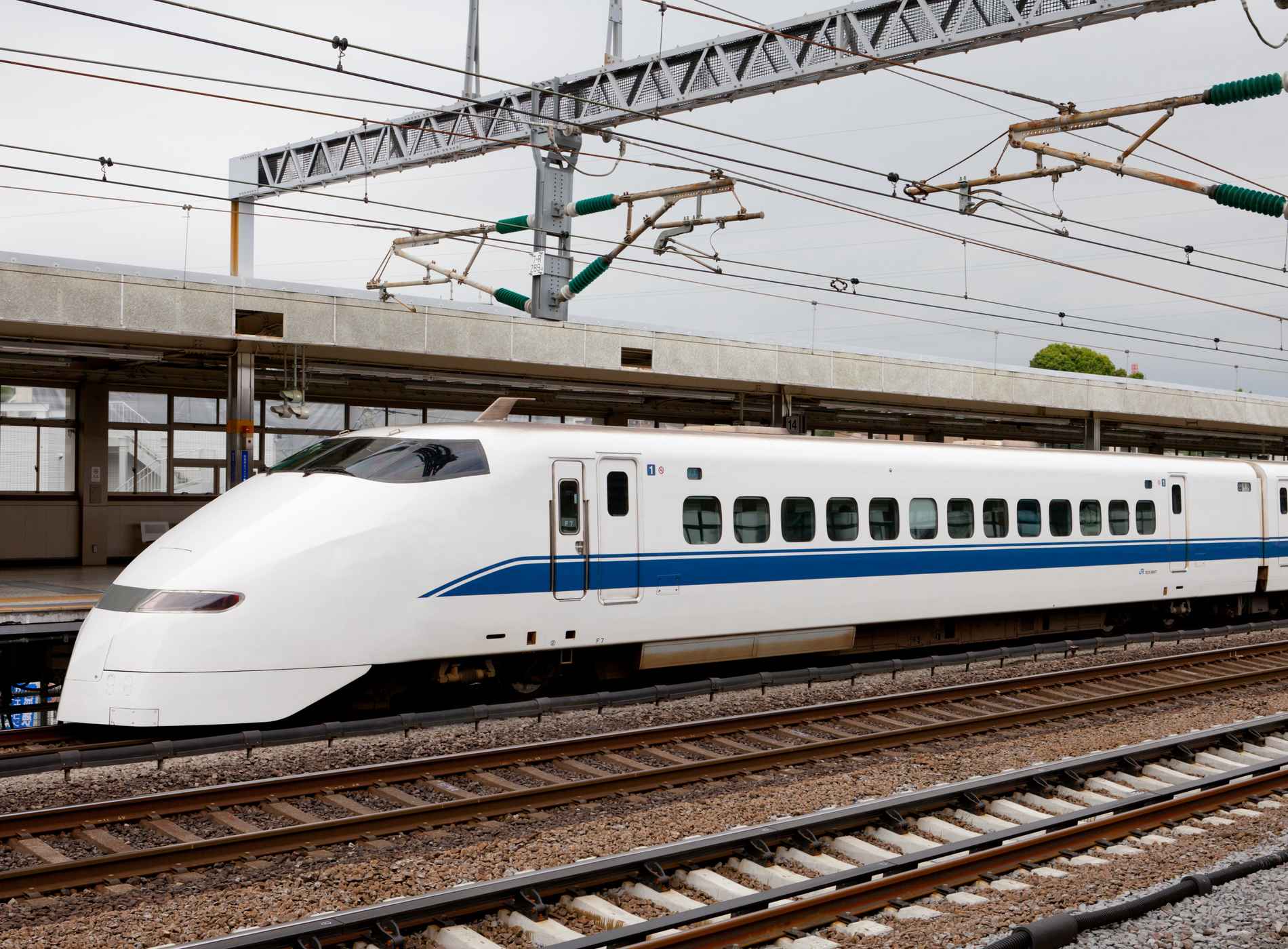 Odawara, Japan - May 31, 2011 : Japan Railway Co. Shinkansen bullet train parked at Odawara Station. This station is located in 1-chome, Sakaecho, Odawara, Japan. It is a 300 Series Shinkansen train.