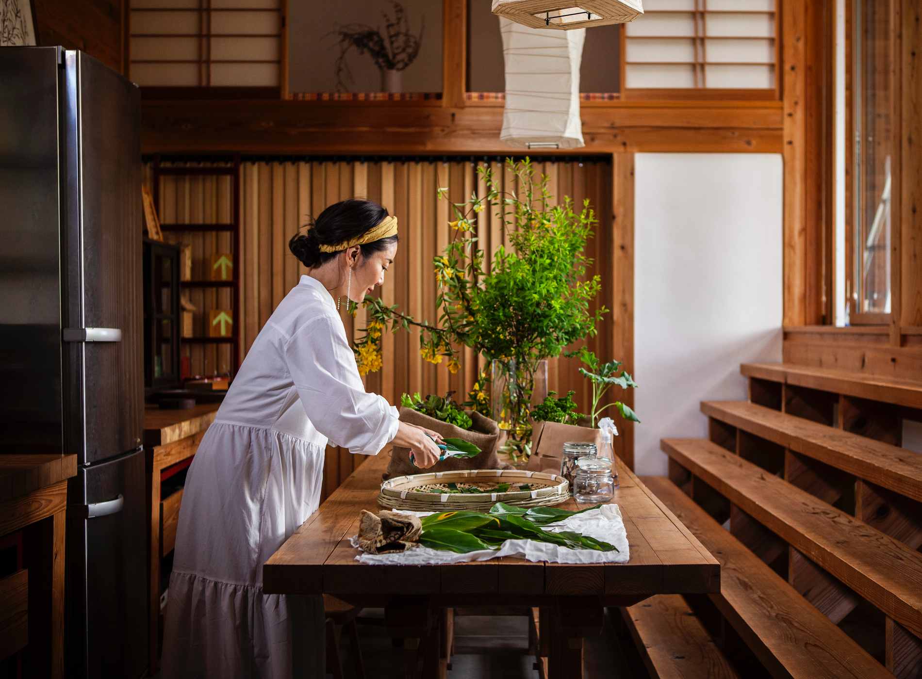 Sustainable lifestyle.
Woman cook on a wooden cooking table.